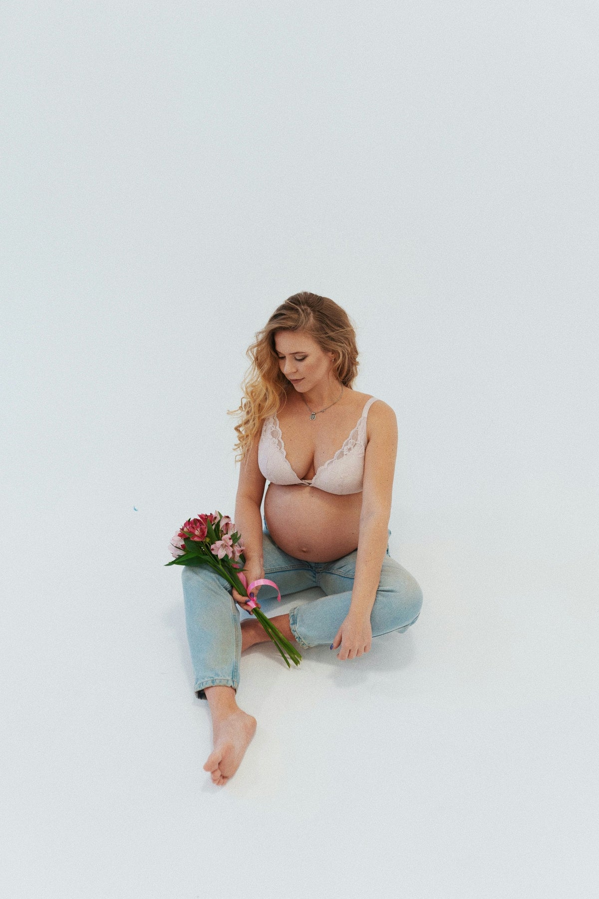 Petal — Lace Bra — independent editorial photograph 3. Photo: Anna Deli; Unsplash HyE8ZHXAOSU. Editorial demo, not manufacturer endorsement.