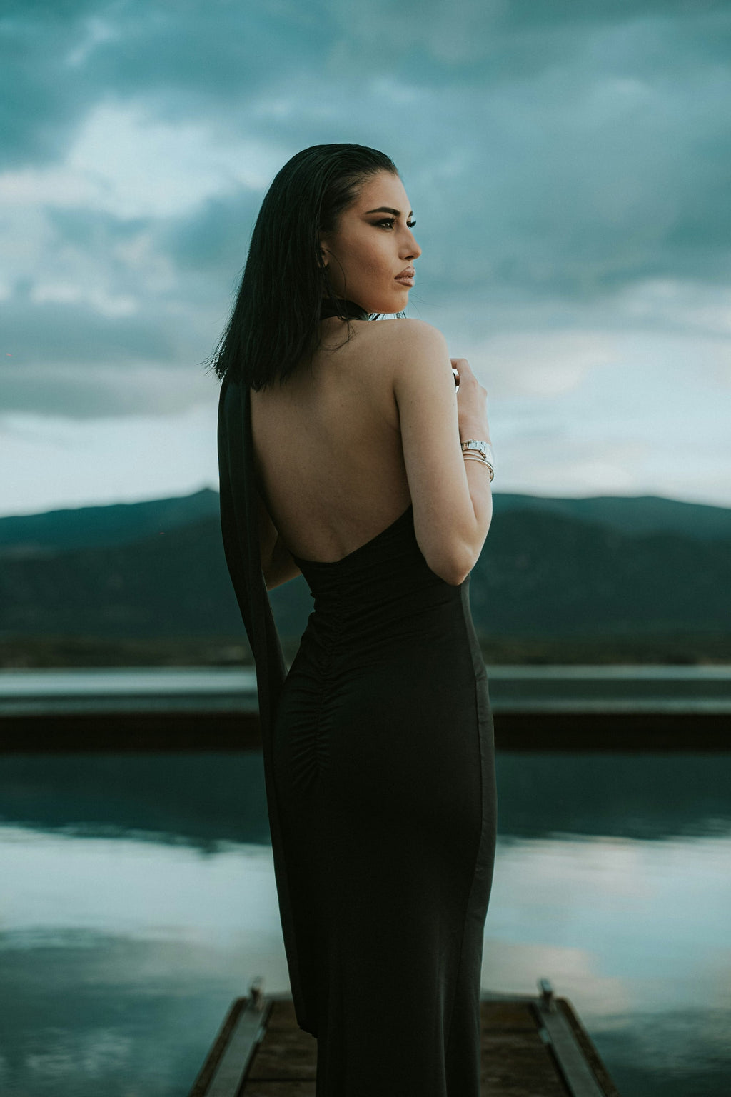 Wind cape-panel dress — editorial photograph 3