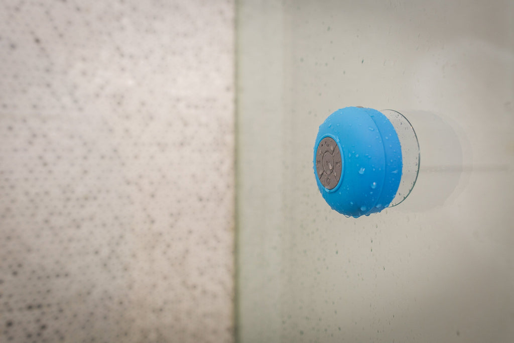 Blue Shower Speaker — Photographic Demo — photograph 3. Photo: Matthew Henry; https://www.shopify.com/stock-photos/photos/bluetooth-speaker-in-shower. Photographic demo.