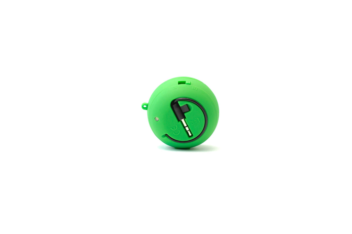 Green Plug Speaker — Photographic Demo — photograph 2. Photo: Matthew Henry; https://www.shopify.com/stock-photos/photos/green-portable-speaker. Photographic demo.
