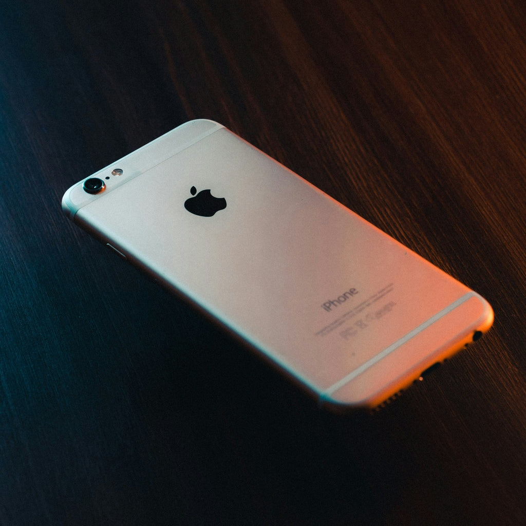 Rose Metal Phone — Photographic Demo — photograph 1. Photo: Luis Felipe Lins; https://unsplash.com/photos/rose-gold-iphone-6-s-hF07reVTNSU. Photographic demo.