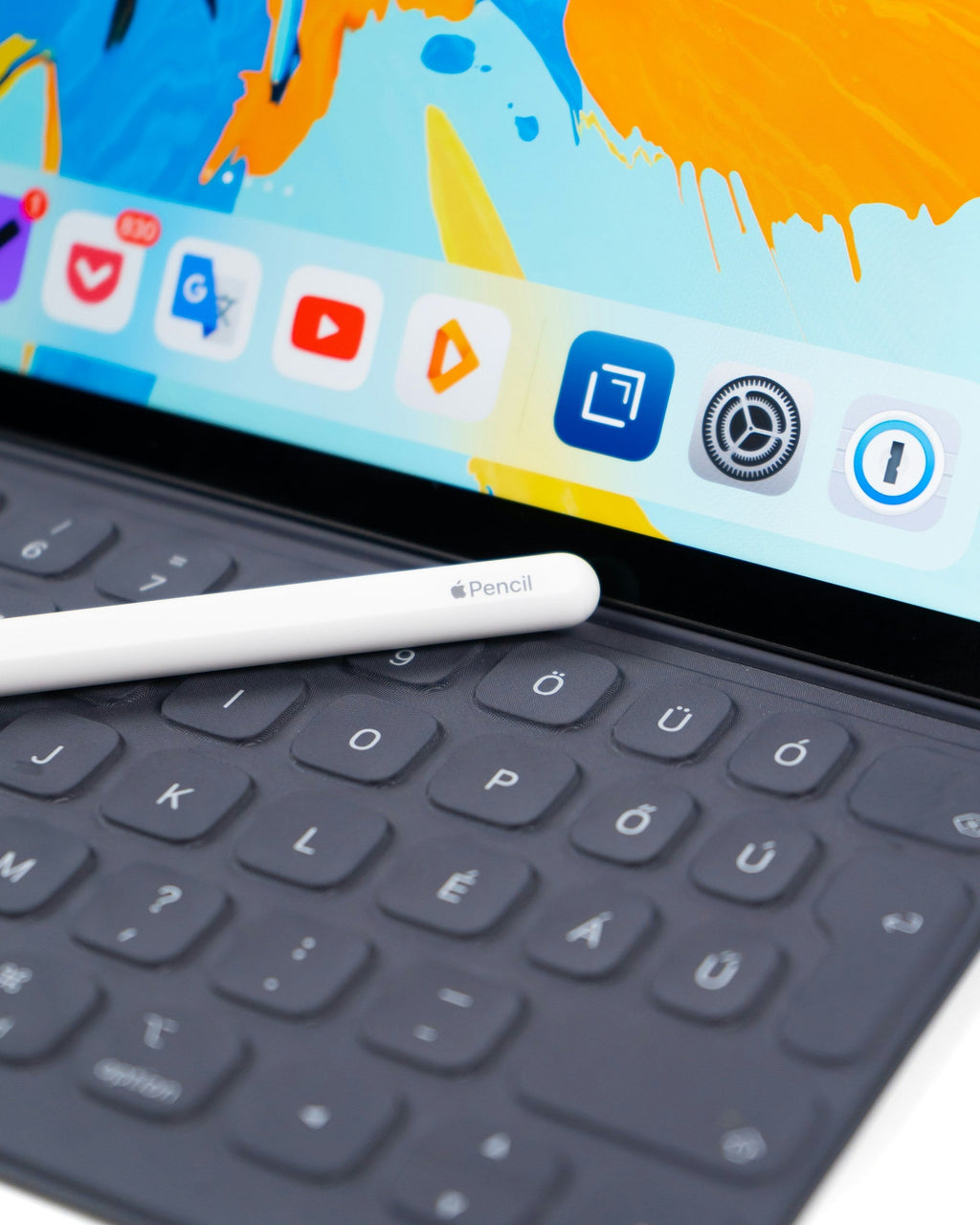 Tablet with Keyboard — Photographic Demo — photograph 3. Photo: Daniel Korpai; https://unsplash.com/photos/white-pencil-stylus-on-grey-laptop-sxvF-yCqE2E. Photographic demo.