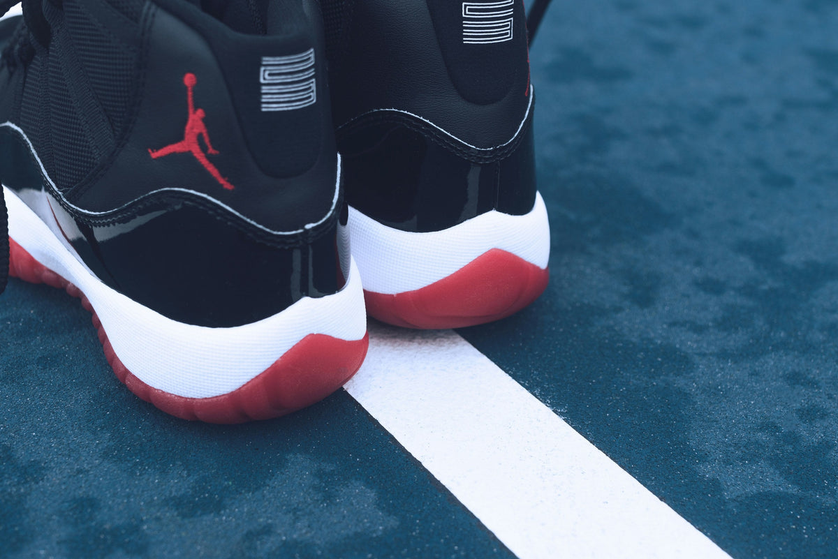 Black Red Patent High Top — Photographic Demo — photograph 1. Photo: Taylor Smith; https://unsplash.com/photos/pair-or-black-red-and-white-air-jordan-athletic-shoes-aBCGO4cnyDQ. Photographic demo.