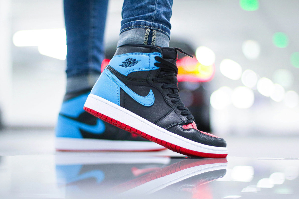 Blue Black High Top — Photographic Demo — photograph 1. Photo: Ryan Plomp; https://unsplash.com/photos/person-wearing-black-and-white-nike-air-jordan-1-shoes-hv36zK2ivyo. Photographic demo.