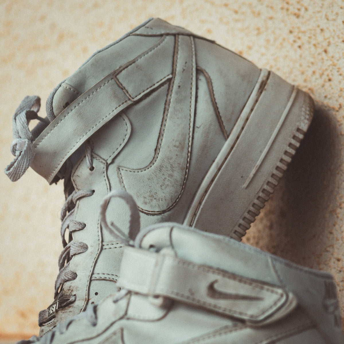 Cream Strap High Top — Photographic Demo — photograph 1. Photo: Luis Felipe Lins; https://unsplash.com/photos/gray-leather-lace-up-shoe-wYnrji6_Css. Photographic demo.