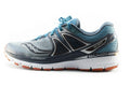 Grey Blue Runner — Photographic Demo — photograph 1. Photo: mostafa mahmoudi; https://unsplash.com/photos/a-close-up-of-a-shoe-on-a-white-background-beoVfTZDEb4. Photographic demo.