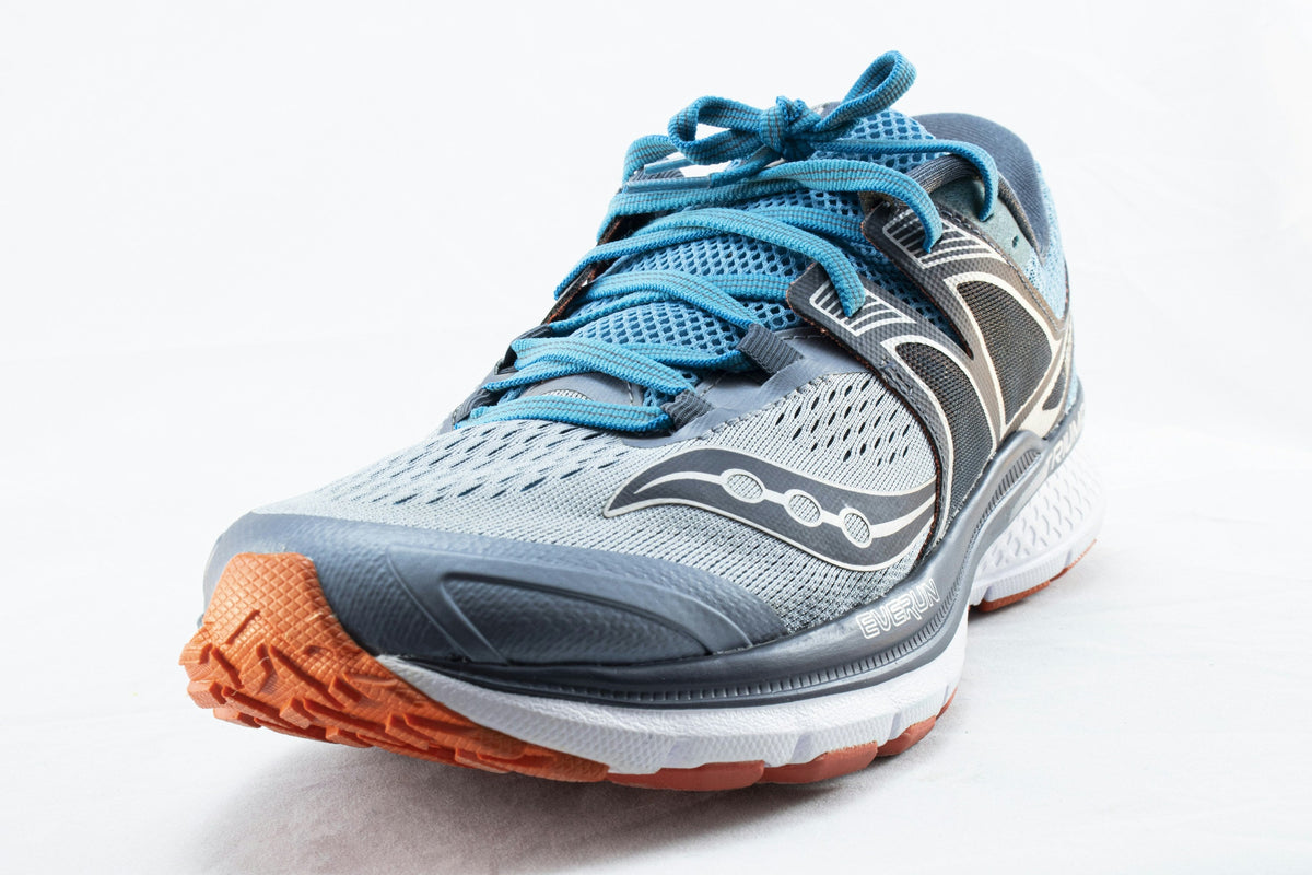 Grey Blue Runner — Photographic Demo — photograph 4. Photo: mostafa mahmoudi; https://unsplash.com/photos/a-close-up-of-a-shoe-on-a-white-background-P_RXel_thDA. Photographic demo.