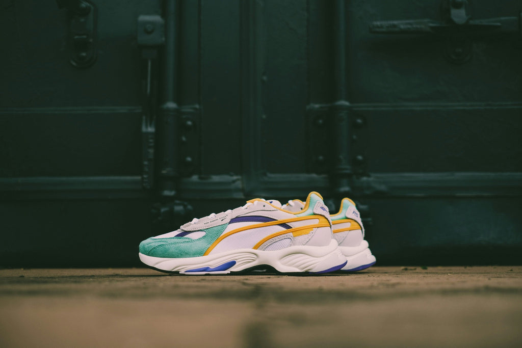 Mint Violet Chunky Runner — Photographic Demo — photograph 1. Photo: Hipkicks; https://unsplash.com/photos/blue-and-white-nike-athletic-shoes-uuJ6eLoTDSs. Photographic demo.