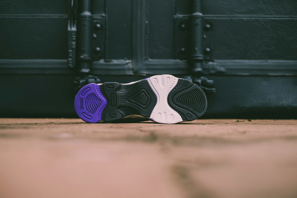 Mint Violet Chunky Runner — Photographic Demo — photograph 3. Photo: Hipkicks; https://unsplash.com/photos/black-and-purple-nike-sneakers--2hmKCgsFP0. Photographic demo.