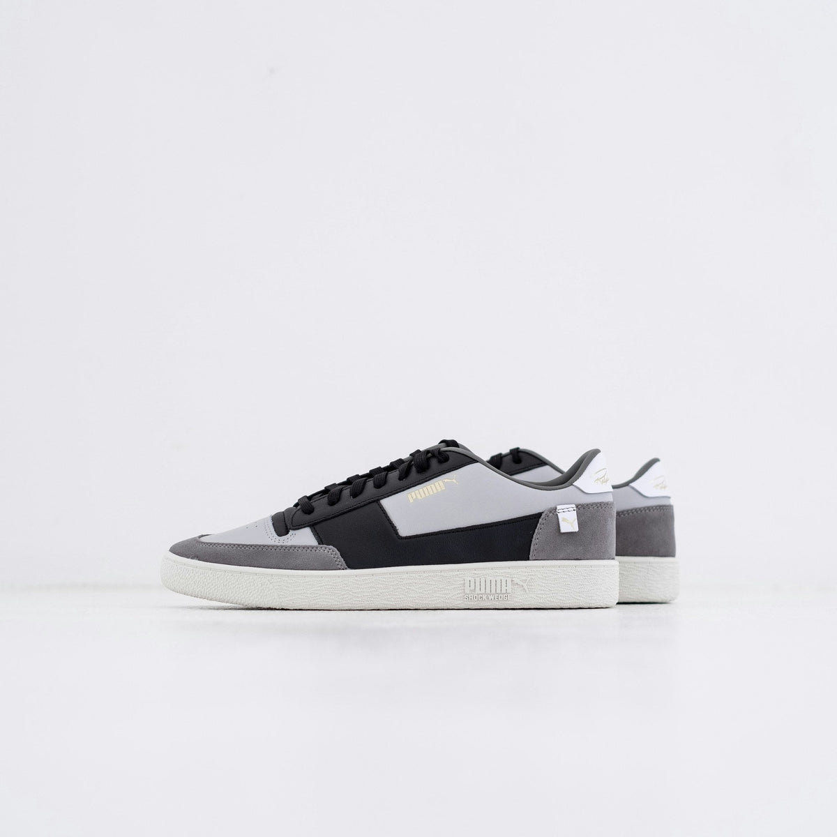 Slate White Low Top — Photographic Demo — photograph 1. Photo: Hipkicks; https://unsplash.com/photos/black-and-white-low-top-sneakers-HcqA34-uWo4. Photographic demo.