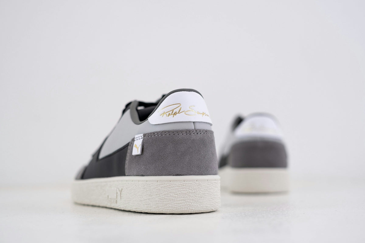 Slate White Low Top — Photographic Demo — photograph 2. Photo: Hipkicks; https://unsplash.com/photos/black-and-white-nike-sneakers-lrLceSQ-tOI. Photographic demo.