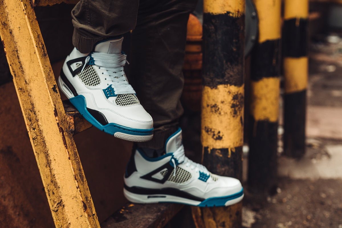 White Teal Sneaker — Photographic Demo — photograph 1. Photo: Matthew Henry; https://www.shopify.com/stock-photos/photos/sneakers-on-ladder. Photographic demo.